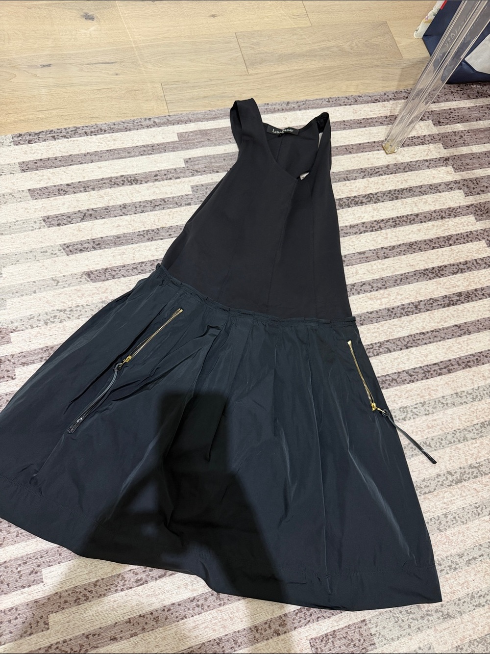 Black Sleeveless A-Line Dress with Zip Pockets